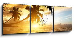 Obraz s hodinami   sunset on the beach of caribbean sea, 150 x 50 cm