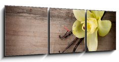 Obraz s hodinami 3D tdln - 150 x 50 cm F_BM49329668 - Vanilla Pods and Flower over Wooden Background