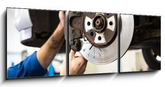 Obraz s hodinami 3D tdln - 150 x 50 cm F_BM76464248 - Focused mechanic adjusting the wheel