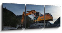 Obraz s hodinami   sideview of huge orange shovel excavator digging in gravel, 150 x 50 cm