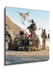Obraz s hodinami 1D - 50 x 50 cm F_F164038449 - Soldiers are Using Drone for Scouting During Military Operation in the Desert. - Vojáci používají dron ke skautingu během vojenské operace v poušti.