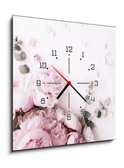 Obraz s hodinami 1D - 50 x 50 cm F_F235909172 - Beautiful, tender fresh blossoming aromatic pink Peony flowers and eucalyptus branches on the white background, top view, flat lay - Krásné, něžné čerstvé kvetoucí aromatické růžové květy pivoňky a eukalyptové větve na bílém pozadí, pohled shora, ploché rozložení