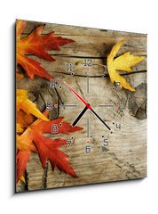 Obraz s hodinami 1D - 50 x 50 cm F_F26583135 - Autumn Leaves over wood background.With copy space