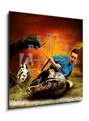 Obraz s hodinami 1D - 50 x 50 cm F_F27573195 - Football player in fires flame on the outdoors field