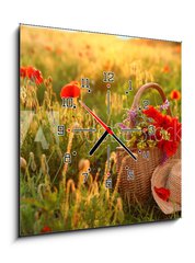 Obraz s hodinami 1D - 50 x 50 cm F_F276027409 - Basket of wildflowers with straw hat in sunlit poppy field