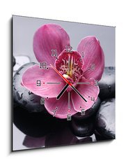 Obraz s hodinami   Macro of red orchid on stone with water drops, 50 x 50 cm