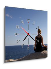 Obraz s hodinami 1D - 50 x 50 cm F_F35709780 - girl sitting on rock over ocean