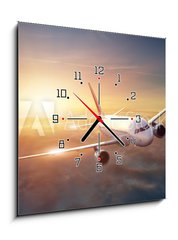 Obraz s hodinami 1D - 50 x 50 cm F_F44261036 - Airplane in the sky at sunset - Letadlo na obloze pi zpadu slunce