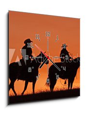 Obraz s hodinami   Cowboys on Horseback Silhouette at sunset, 50 x 50 cm