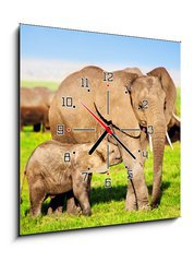 Obraz s hodinami 1D - 50 x 50 cm F_F49494592 - Elephants family on savanna. Safari in Amboseli, Kenya, Africa - Rodina slonů na savaně. Safari v Amboseli, Keňa, Afrika