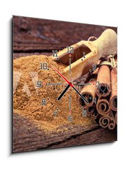 Obraz s hodinami   Cinnamon sticks and cinnamon powder, 50 x 50 cm
