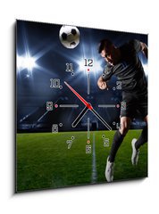 Obraz s hodinami 1D - 50 x 50 cm F_F66124797 - Hispanic Soccer Player heading the ball - Hispnsk fotbalista m m