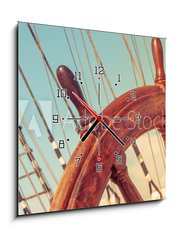 Obraz s hodinami   Steering wheel of old sailing vessel, 50 x 50 cm
