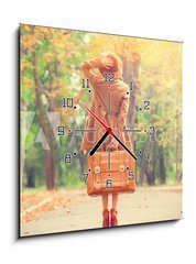 Obraz s hodinami 1D - 50 x 50 cm F_F69484488 - Redhead girl with suitcase in the autumn park.