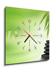 Obraz s hodinami   Spa background with stacked massage stones and bamboo, 50 x 50 cm