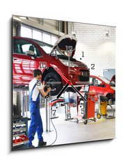 Obraz s hodinami   Reifenwechsel in einer KFZ Werkstatt // Tire change by mechanic, 50 x 50 cm