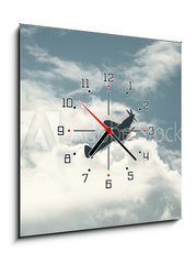 Obraz s hodinami 1D - 50 x 50 cm F_F72446158 - Fighter plane on cloudy sky - Bojov letadlo na zataen obloze