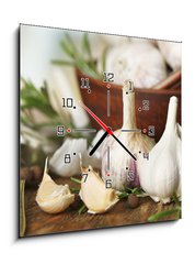 Obraz s hodinami 1D - 50 x 50 cm F_F74114522 - Raw garlic and spices on wooden table - Surov esnek a koen na devnm stole