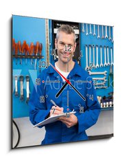 Obraz s hodinami 1D - 50 x 50 cm F_F76802696 - Smiling mechanic looking at camera