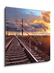 Obraz s hodinami 1D - 50 x 50 cm F_F81148616 - Orange sunset in low clouds over railroad - Oranžový západ slunce v nízkých mracích nad železnicí