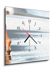 Obraz s hodinami 1D - 50 x 50 cm F_F81152992 - Woman walking on sand beach