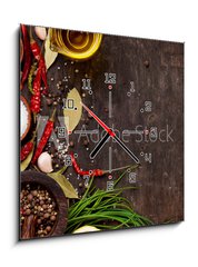 Obraz s hodinami 1D - 50 x 50 cm F_F86522386 - Various spices on wooden background - Rzn koen na devnm pozad