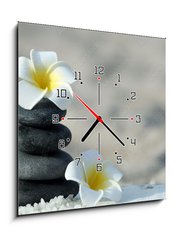 Obraz s hodinami 1D - 50 x 50 cm F_F92571268 - Spa stones with flowers on sand beach close up