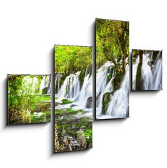 Obraz 4D tydln - 120 x 90 cm F_IB107722539 - Scenic waterfall with crystal clear water among green forest