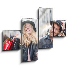 Obraz   a trendy young couple wearing hats walking in the city in autum, 120 x 90 cm