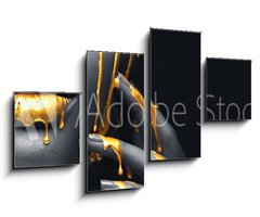 Obraz 4D tydln - 100 x 60 cm F_IS238048386 - Golden paint smudges drips from the face lips and hand, golden liquid drops on beautiful model girl