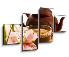Obraz 4D čtyřdílný - 100 x 60 cm F_IS24345742 - Cup of green tea on the table with orchid flower