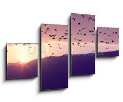Obraz 4D tydln - 100 x 60 cm F_IS37700640 - Flock of Birds Flying at the Sunset above Mountian at the sunset
