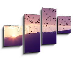 Obraz 4D tydln - 100 x 60 cm F_IS37700640 - Flock of Birds Flying at the Sunset above Mountian at the sunset