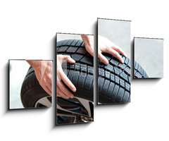 Obraz 4D tydln - 100 x 60 cm F_IS66921054 - Reifenwechsel in einer KFZ Werkstatt // Tire change by mechanic