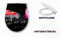 WC sedtko 44325294 - Spa stones with orchid flower and candles isolated on black